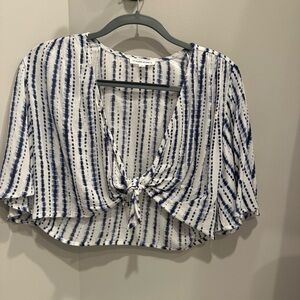 White and blue set. Top ties in the front and flowy shorts.